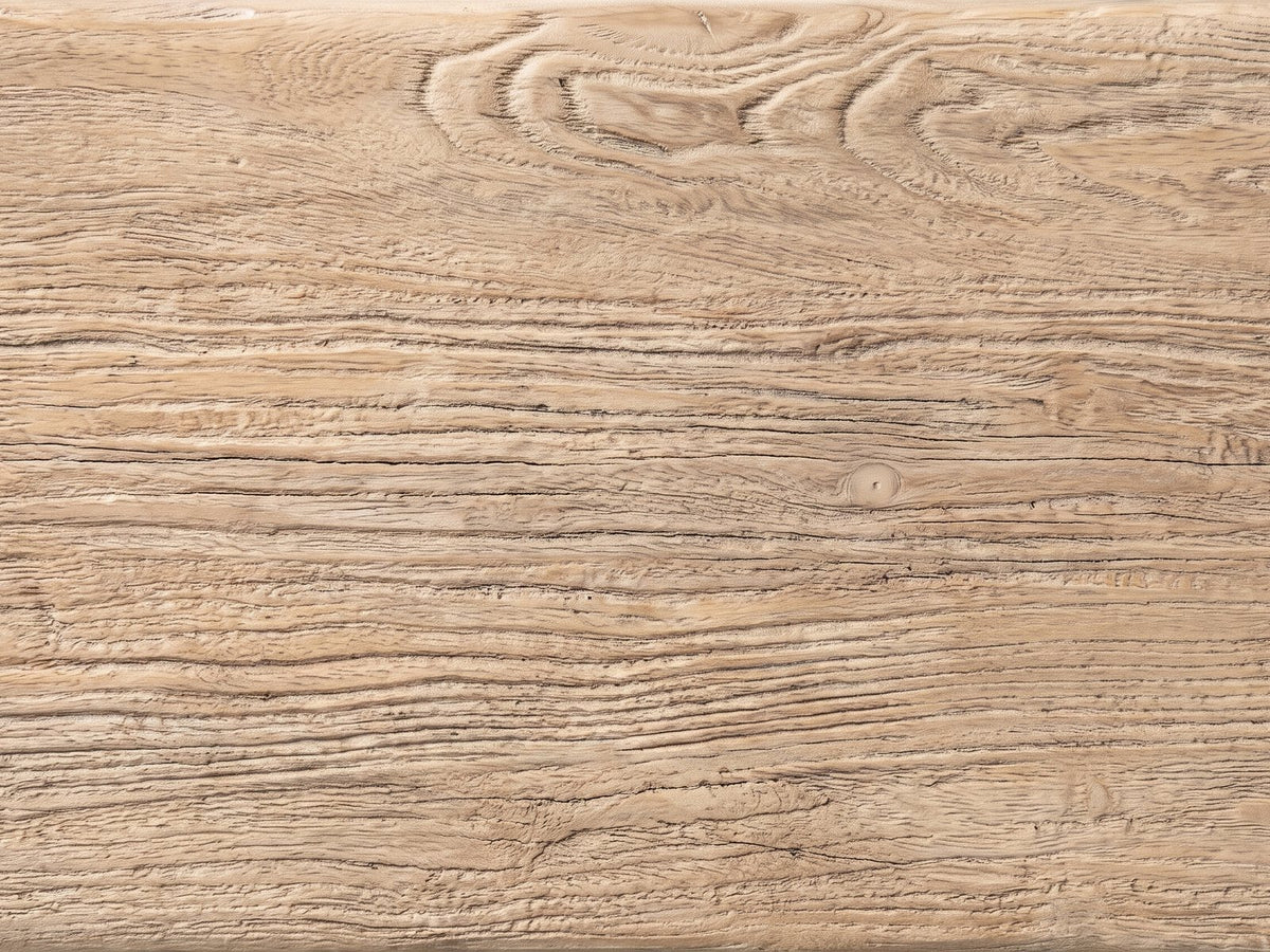 Close-up of the Ginosa Reclaimed Elm Trestle Console Table: the wire-brushed grain of the reclaimed elm top