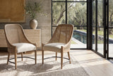 Gioiosa Cane-Back Upholstered Wood Dining Chair (Set of 2) in a sunlit villa dining room