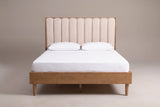 Giulianova bed in wheat pine with an oatmeal scalloped headboard, a white mattress and pillows (not included), front view