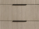 Close-up of the Gradisca 50-Inch Light Oak 4-Drawer Chest: the vertical oak reeds of the drawer fronts and the slim bronze edge pulls