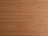 Close-up of the Grado 34-Inch Warm Walnut 5-Drawer Chest: the warm walnut veneer of the top