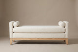 The Gualdo bench in ivory boucle, straight front view on a light studio backdrop
