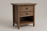 The Iglesias two-drawer nightstand in rustic aged brown with round bronze knobs and an open shelf, three-quarter view on a light studio backdrop