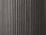 Close-up of the Irsina Cast Aluminum Tulip Pedestal Side Table: the fine vertical ribs of the black nickel pedestal