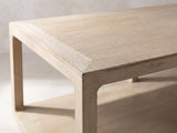 Close-up of the Ivrea Reclaimed Pine Open-Frame Coffee Table: the mitred top corner and rounded inside corner of the pine frame