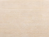 Close-up of the Ivrea Reclaimed Pine Open-Frame Coffee Table: the wire-brushed cerused grain of the reclaimed pine top