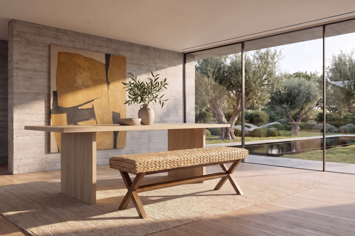 Jacurso 45-Inch Woven Water Hyacinth Bench with X-Base in a sunlit villa dining room