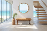 Jacurso 45-Inch Woven Water Hyacinth Bench with X-Base in an oceanfront glass house