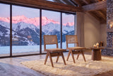 Joppolo Cane-Back Rubberwood Dining Chair (Set of 2) in an alpine chalet