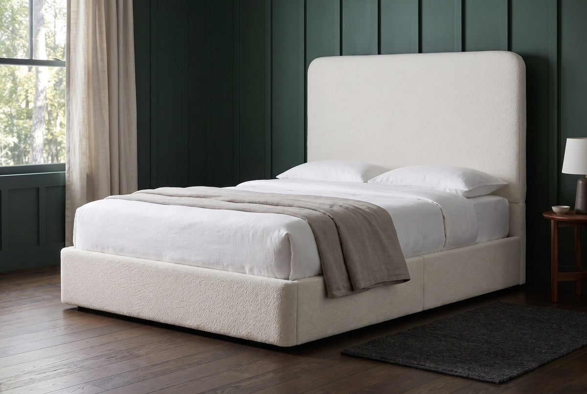 Lanciano bed against deep forest green board and batten walls in an Asheville mountain cabin bedroom with a dark oak floor