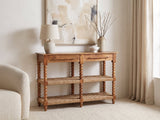 Laterza Mango Wood Spindle Console Table against a plaster wall under an abstract canvas in a bright living room