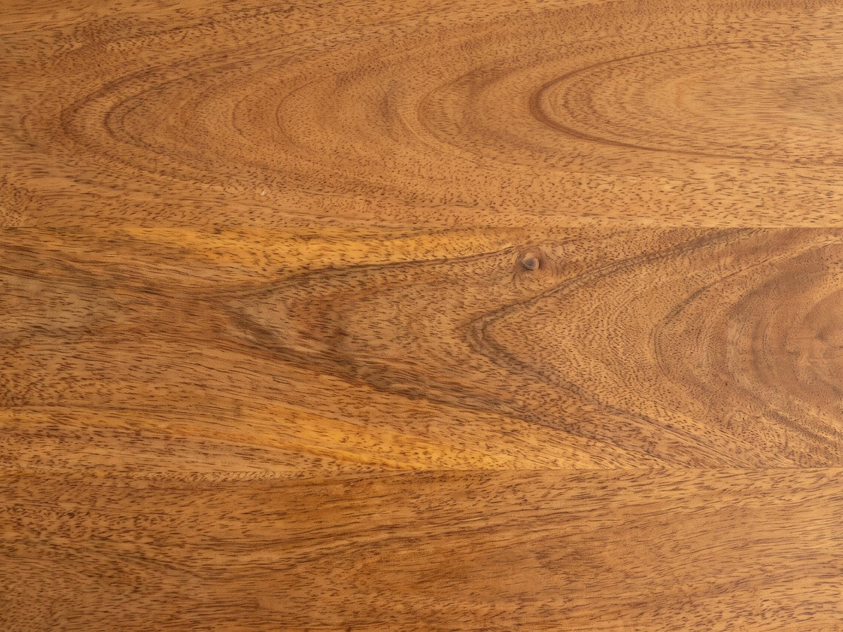 Close-up of the Laterza Mango Wood Spindle Console Table: the chestnut grain of the solid mango top