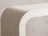 Close-up of the Leporano Capiz Shell Waterfall Console Table: the capiz shell tiles following the rounded waterfall bend