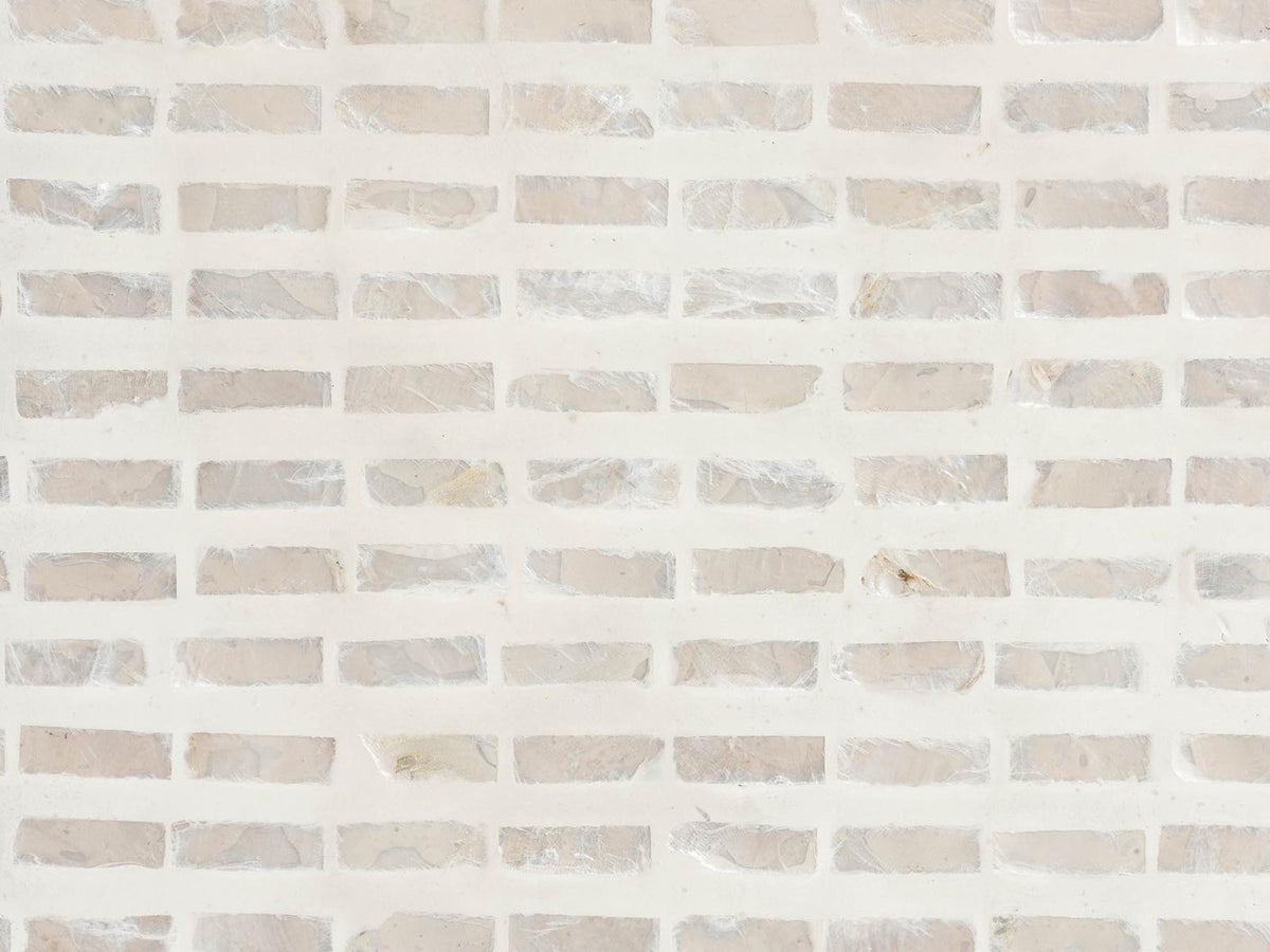 Close-up of the Leporano Capiz Shell Waterfall Console Table: the pale capiz shell mosaic of the top