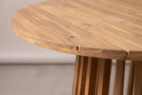 Close-up of the solid acacia on the Levanzo table: the edge of the slatted top in light teak finish with the natural grain
