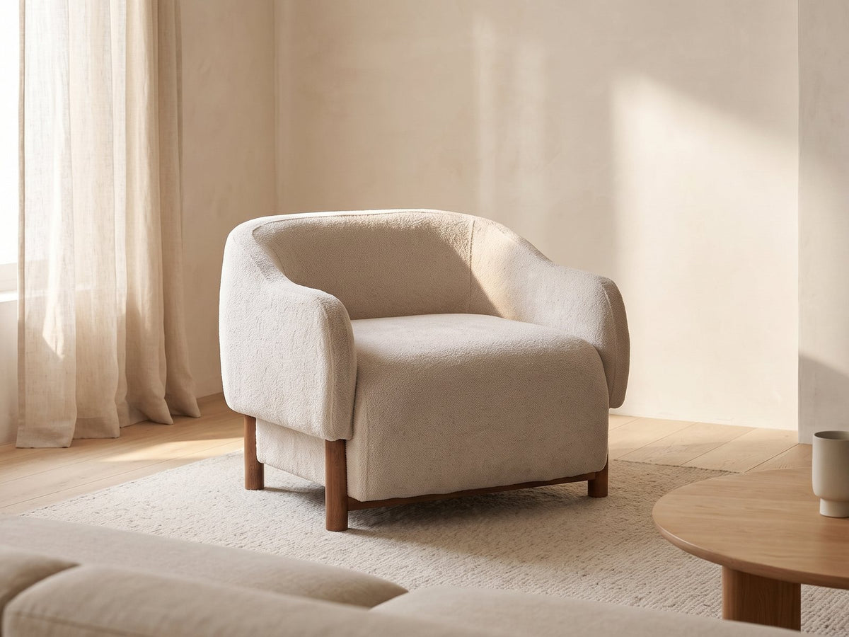 Lido Curved Shell Lounge Chair in a furnished room