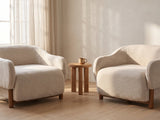 The Lido lounge chair styled in a room setting