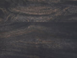 Close-up of the Lizzano Black Mango Wood Bobbin Console Table: the carbon ash finish on the mango top with the grain showing through