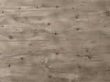 Close-up of the Locri 47-Inch Round Fir Lattice Pedestal Dining Table: the natural fir top with small dark knots