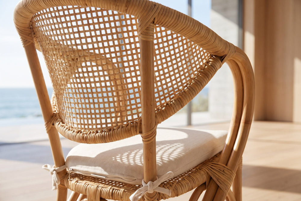 Close-up of the Longobardi Oval-Back Natural Rattan Dining Chair: weave