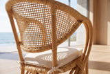Close-up of the Longobardi Oval-Back Natural Rattan Dining Chair: weave