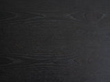 Close-up of the Lonigo 38-Inch Peppercorn 3-Drawer Chest: the wire-brushed elm grain of the top under the peppercorn finish