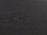 Close-up of the Lusiana 35-Inch Peppercorn Black 5-Drawer Chest: the flat-cut black peppercorn elm veneer grain