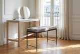 Luzzi 28-Inch Gray Hair-on-Hide Patchwork Iron Bench, Seats 1 in a Paris salon