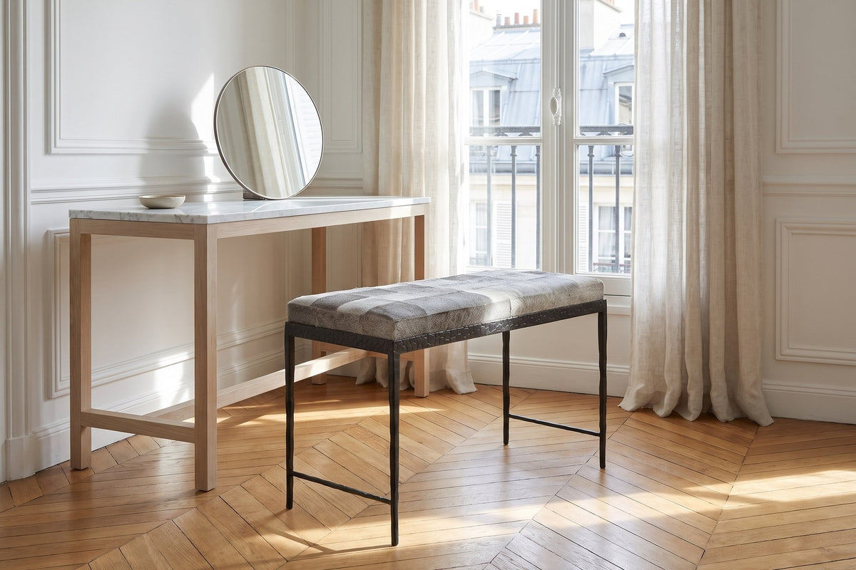 Luzzi 28-Inch Gray Hair-on-Hide Patchwork Iron Bench, Seats 1 in a Paris salon