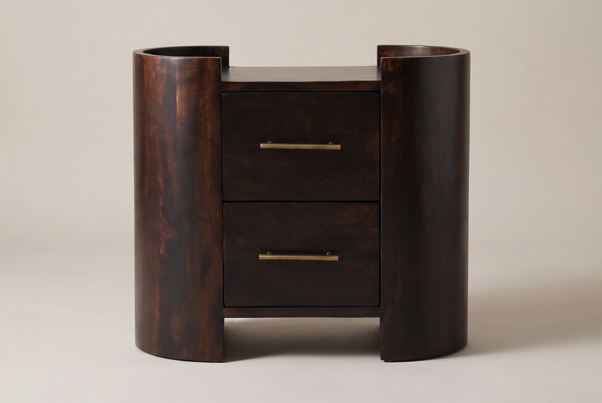 The Macomer nightstand in dark mocha mango, front view on a light studio backdrop: two half-round columns with the two drawers between them
