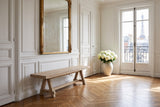 Magisano 72-Inch Reclaimed Elm Trestle Dining Bench in a Paris salon