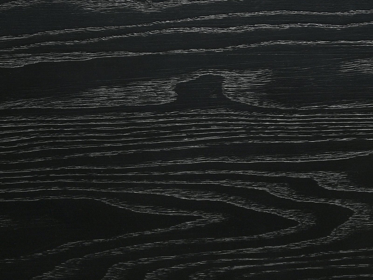 Close-up of the Malcesine 63-Inch Wire-Brushed Black 8-Drawer Dresser: grain