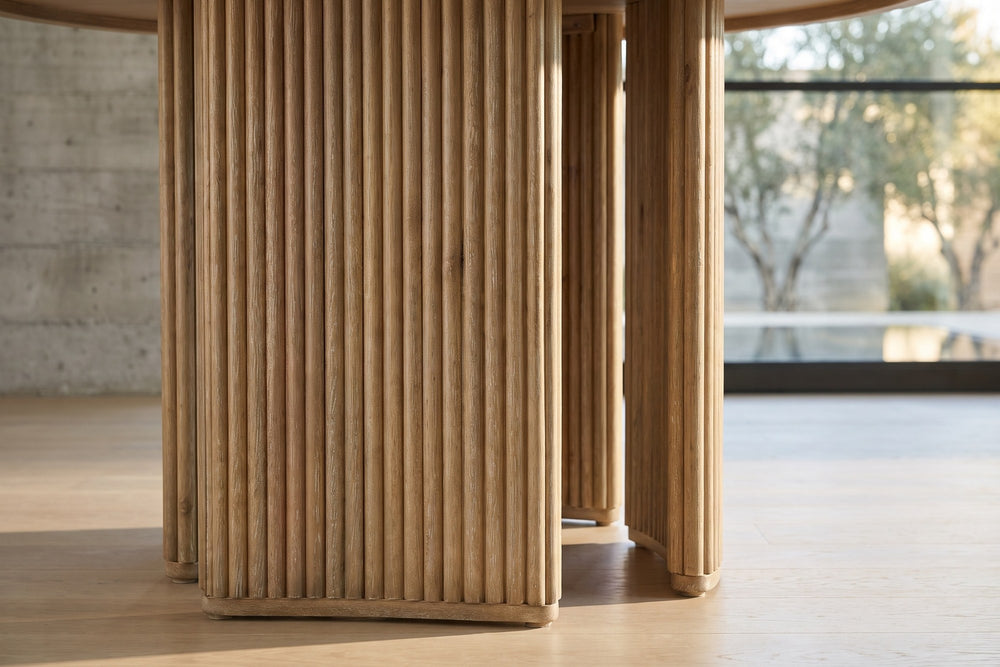 Close-up of the Malvito 53-Inch Round Ash Veneer Reeded Pedestal Dining Table: reeds