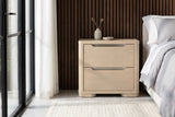Mandas light elm nightstand beside a bed in a Denver bedroom with dark walnut slat panelling, a pale stone floor and a tall black steel window