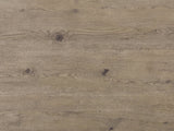 Close-up of the Maniago 42-Inch Weathered Natural Oak 5-Drawer Chest: the weathered knotty oak grain of a drawer front