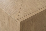 Close-up of the light caramel oak veneer on the Maratea sideboard: open grain, a mitred edge and the book-matched seam on the top