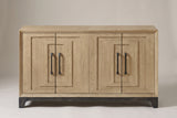 The Maratea sideboard in light caramel oak veneer, straight front view on a light studio backdrop: four doors, four black pulls, a dark base