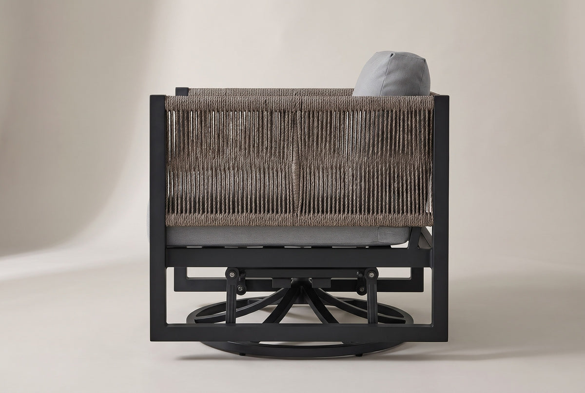 The Marsala swivel glider lounge chair from the side: the rope arm panel, the black side frame, two glider links and the round swivel base