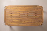 The Mazara dining table seen from directly above: the rounded-rectangle top, lengthwise acacia slats in a teak finish and the solid border frame