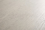 Close-up of the Melfi nightstand: wire-brushed gray oak with the open grain showing as fine darker lines