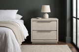 Melfi gray oak nightstand with a ceramic lamp against a deep green wall in a Portland bedroom with a dark wood floor and a wool rug