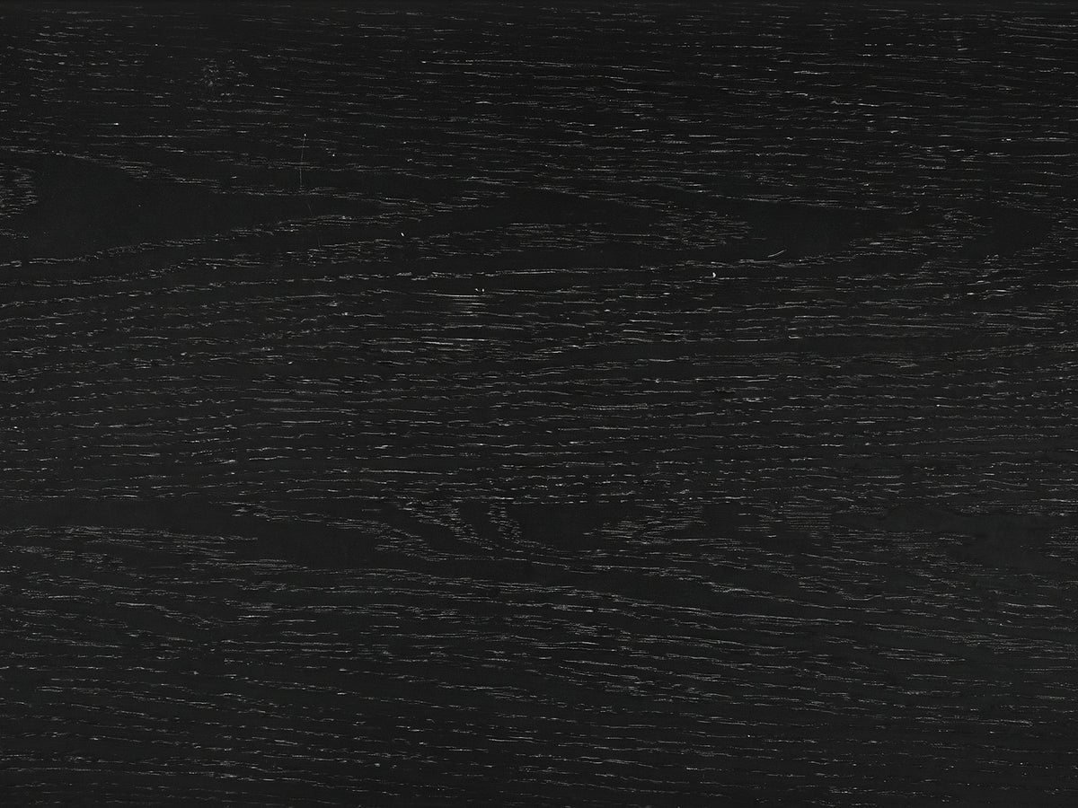 Close-up of the Minervino Black Oak Fluted Racetrack Console Table: the black oak veneer of the top