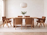 Minturno 95-Inch Light Oak Sled Base Dining Set with 6 Chairs in a bright plaster dining room with linen curtains