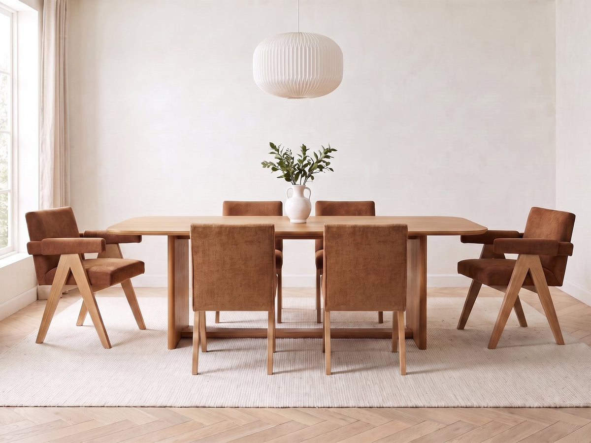 Minturno 95-Inch Light Oak Sled Base Dining Set with 6 Chairs in a bright plaster dining room with linen curtains
