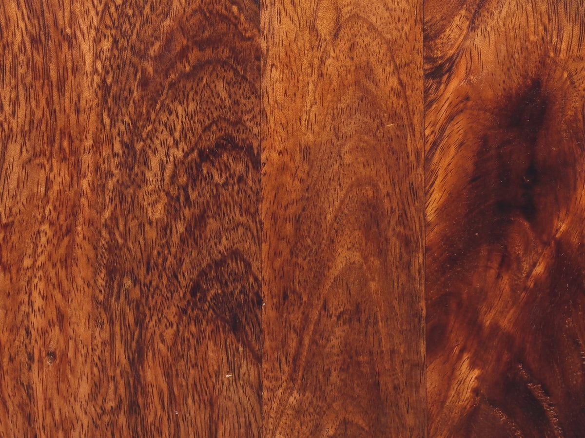 Close-up of the Mira 28-Inch Honey Caramel Solid Mango 3-Drawer Chest: the swirling figure of the solid mango