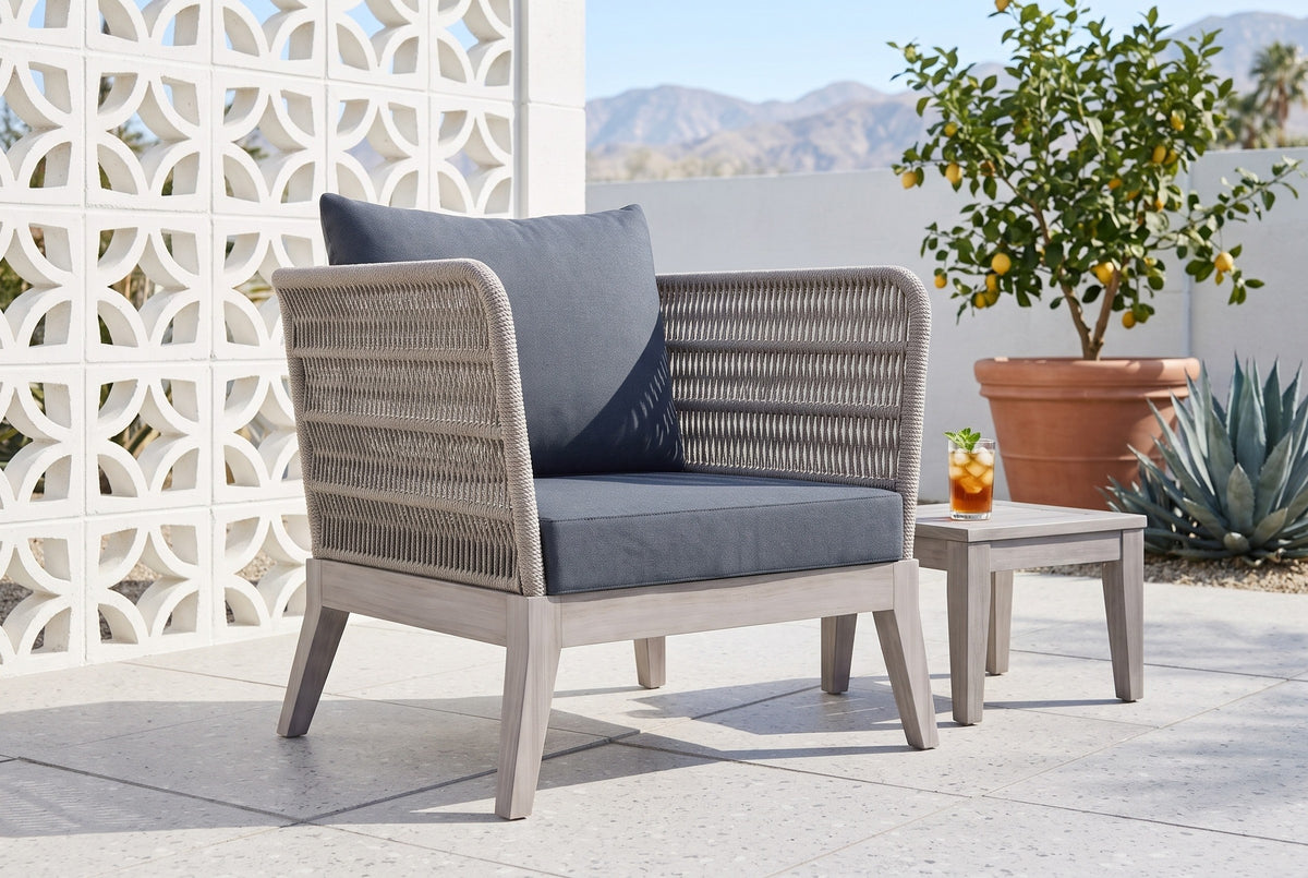 Mistretta rope lounge chair on a terrazzo patio in Palm Springs beside a white breeze-block screen, a lemon tree and blue agave (side table not included)