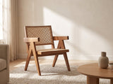 Modena Cane Lounge Chair in a furnished room