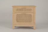 The Mogoro nightstand in natural pine, front view on a light studio backdrop
