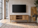 Monopoli Mango and Brass Media Console under a wall-mounted screen in an industrial loft