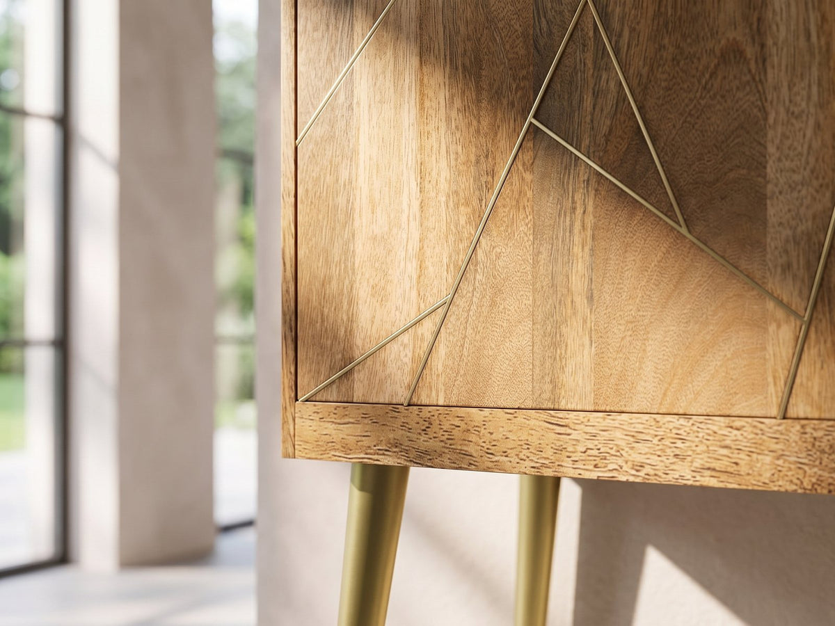 Close-up of the Monopoli Mango and Brass Media Console: the brass inlay lines on the natural mango door front